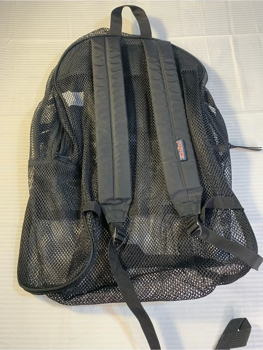 JanSport Mesh Pack Backpack in Black, a semi-trans. EC style TB500315
